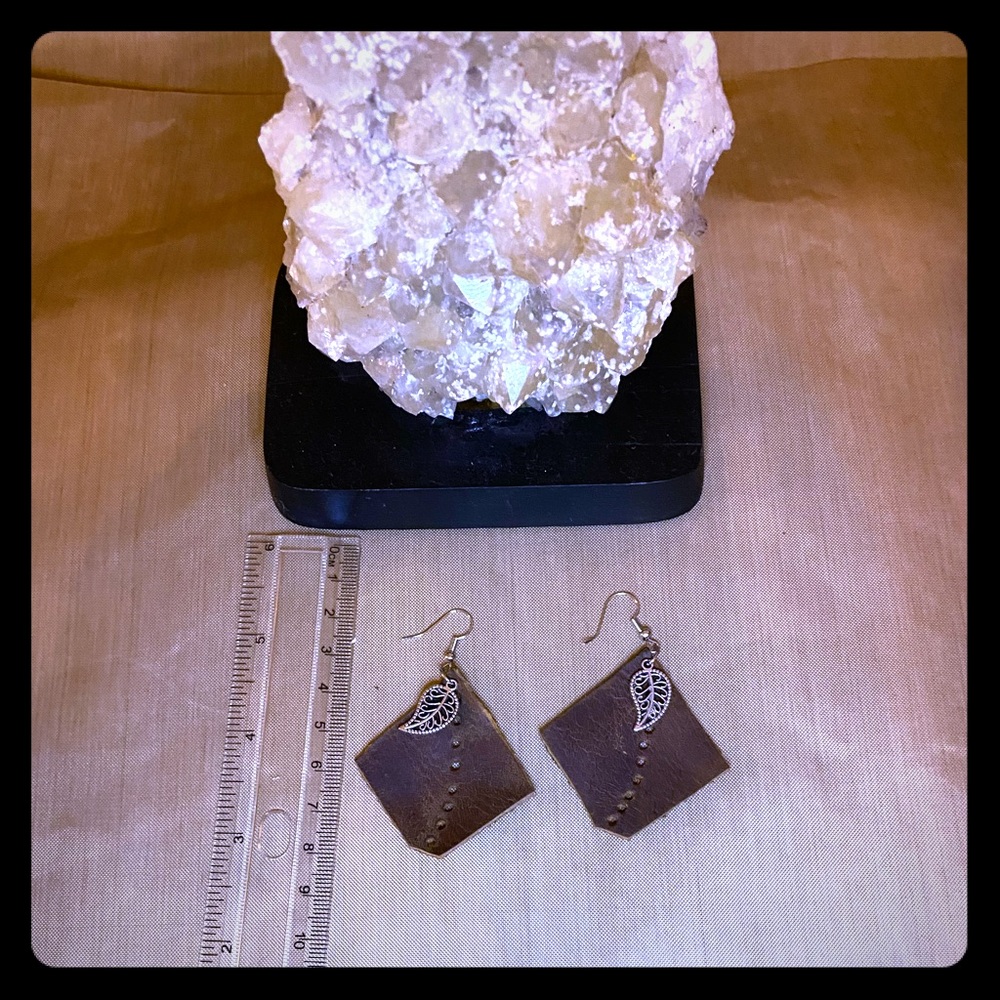 Leather up cycle earrings. Metal hooks.